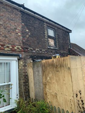 Click Here To Enlarge This Photo Of Damaged Brickwork
