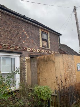 Click Here To Enlarge This Photo Of Damaged Brickwork