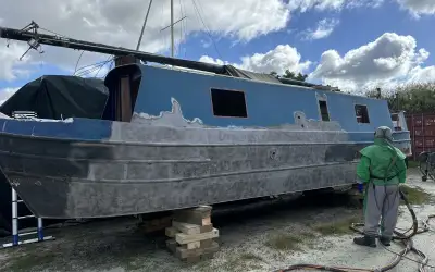 Photo of Sand Blasting a Narrow Boat