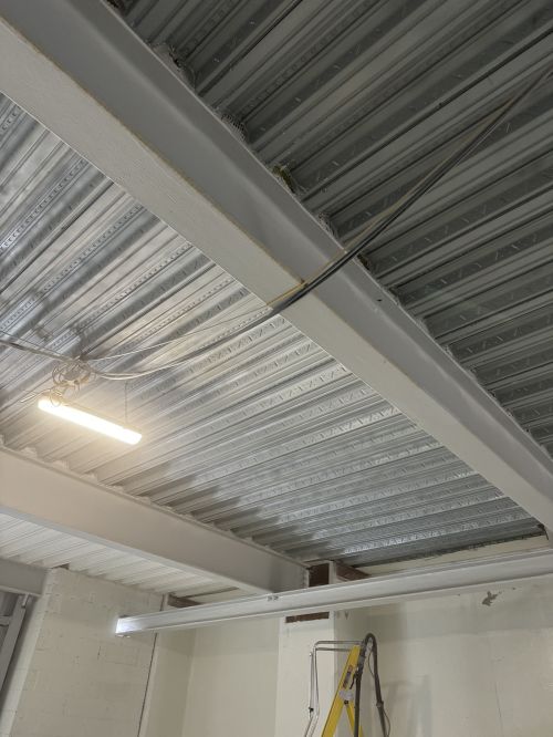 Click Here To Enlarge This Photo Of Sand Blasting Power Station Rib Deck Soffit