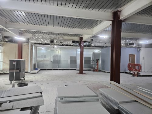 Click Here To Enlarge This Photo Of Sand Blasting Steel Columns for Dyson's new R&D Building