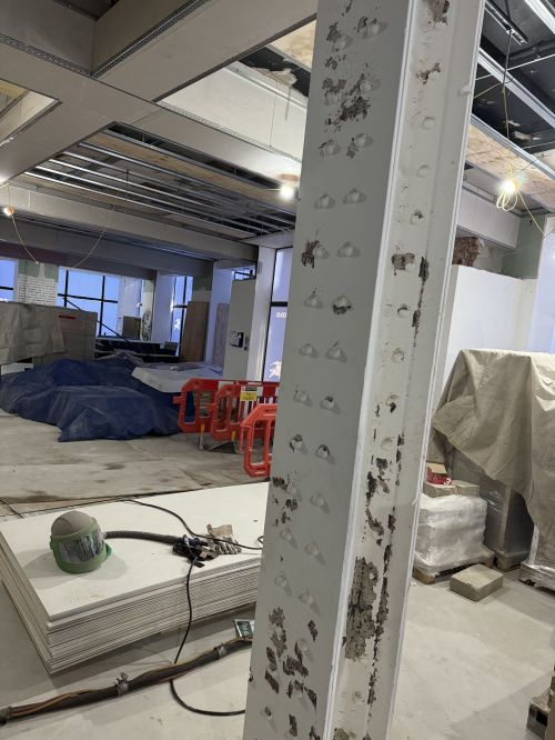 Click Here To Enlarge This Photo Of Sand Blasting Steel Columns at Burberry HQ