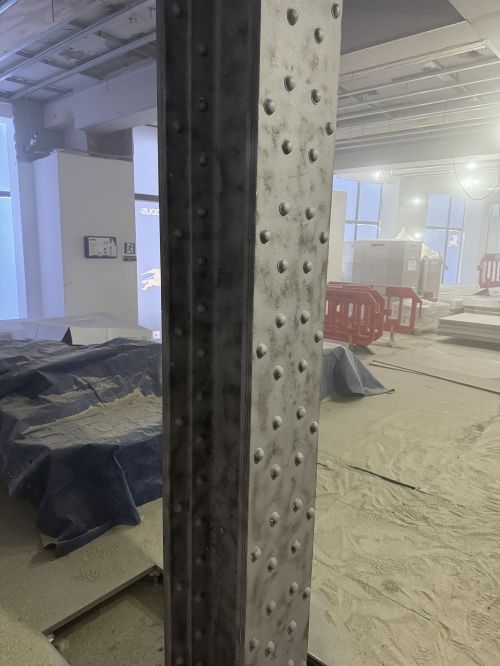 Click Here To Enlarge This Photo Of Sand Blasting Steel Columns at Burberry HQ