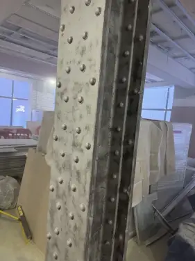 Click Here To Enlarge This Photo Of Sand Blasting Steel Columns at Burberry HQ